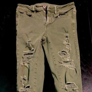 Army green ripped jeans